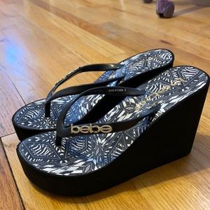 Bebe wedge flip flops